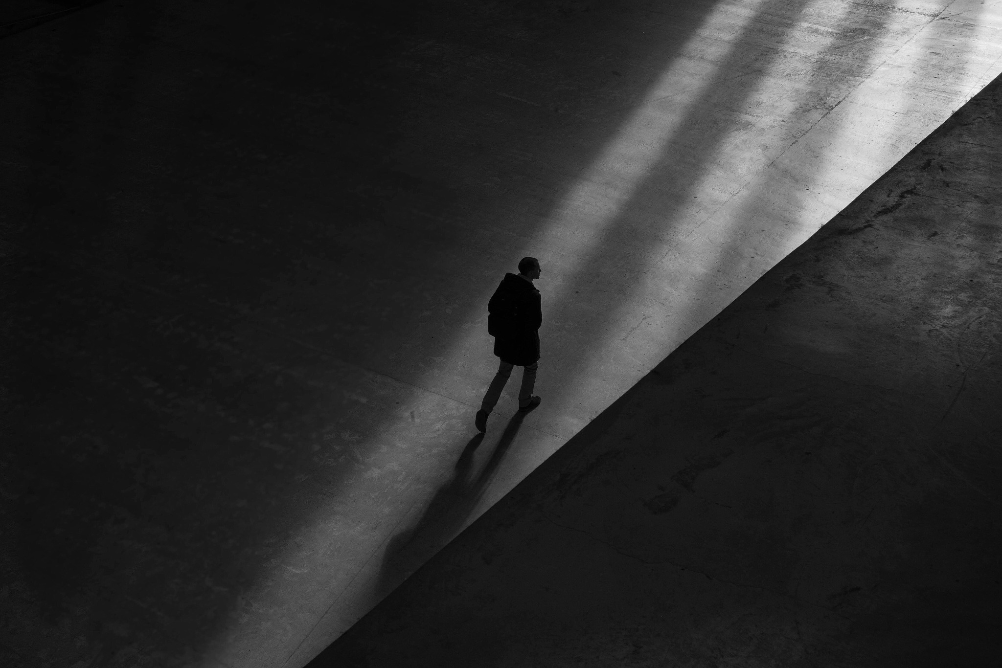 Person walking through light